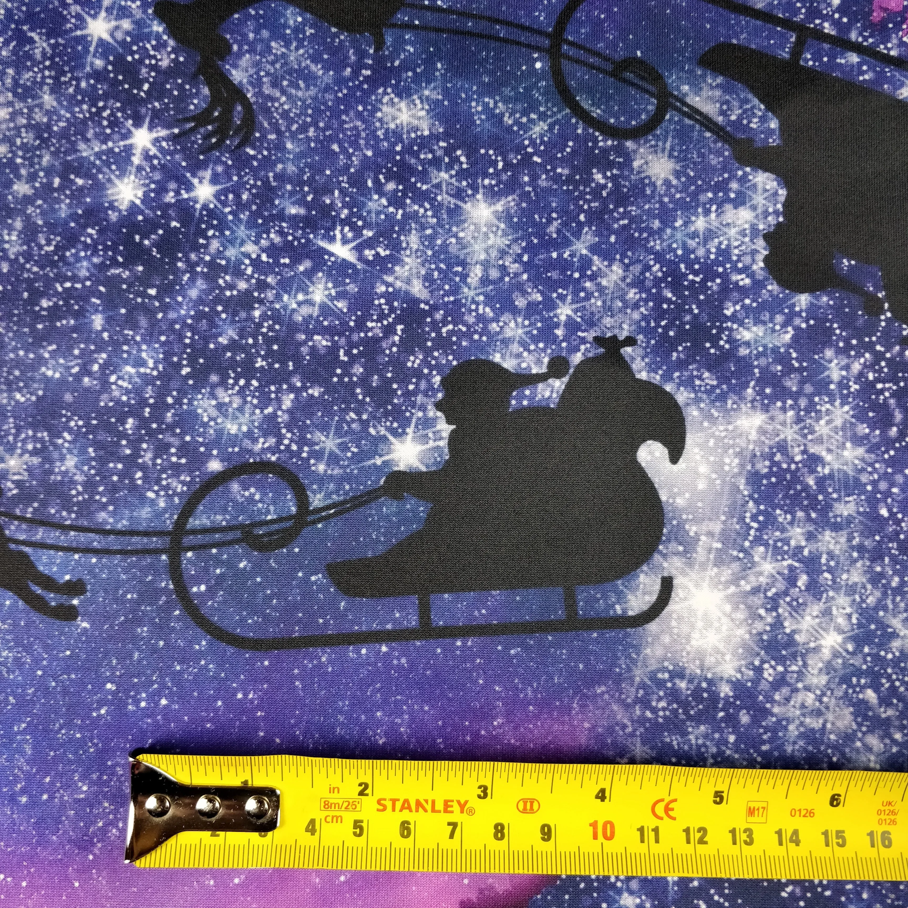 FS342 Galaxy Reindeer Scuba Stretch Knit Fabric Purple Black
