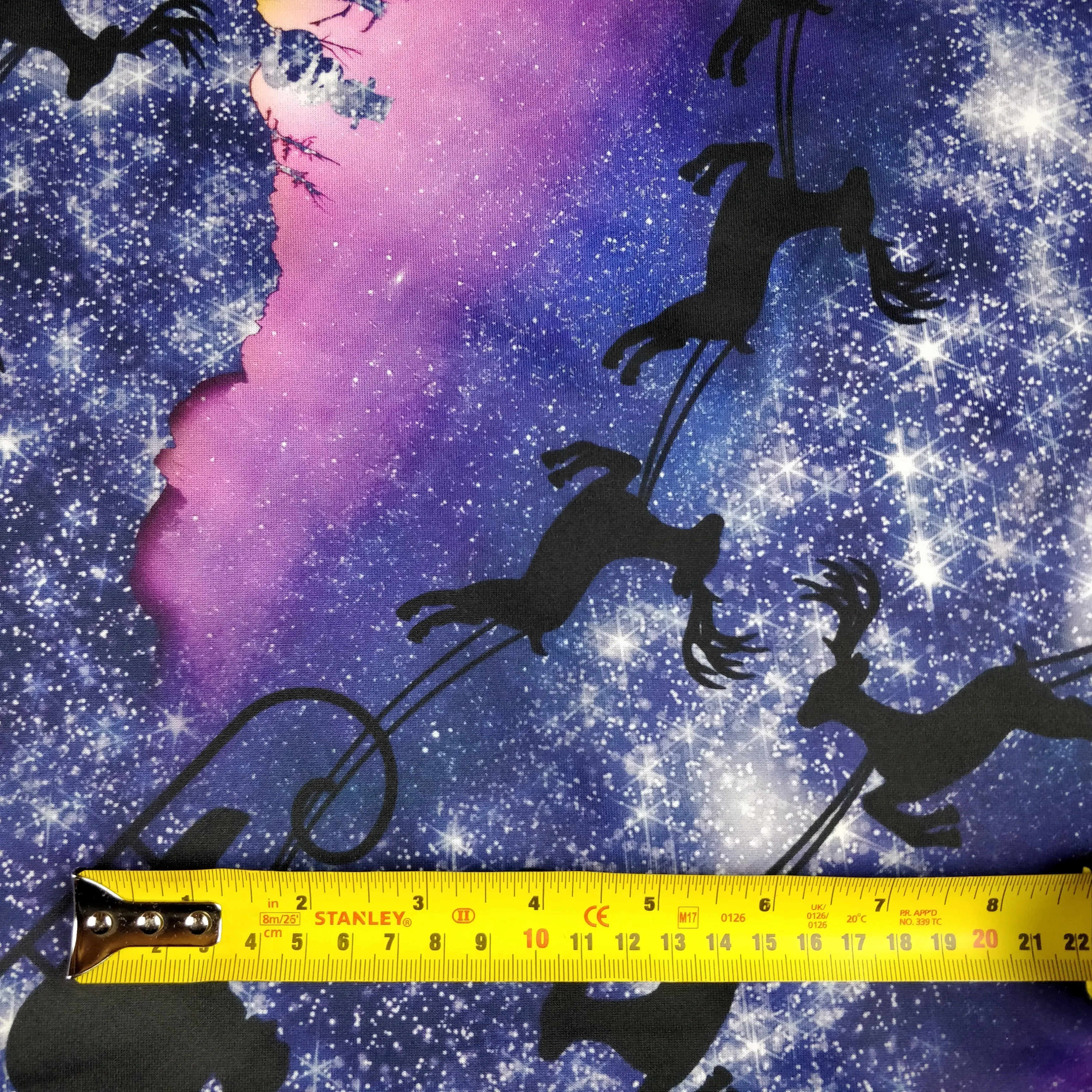 FS342 Galaxy Reindeer Scuba Stretch Knit Fabric Purple Black